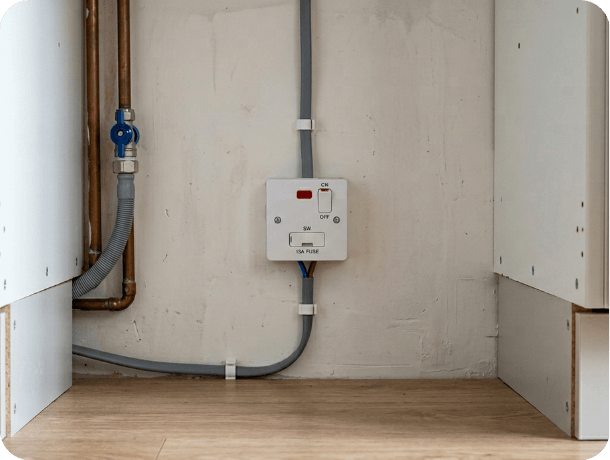 “Hardwired appliance electrical connection with fused spur and exposed wiring for dishwasher installation.