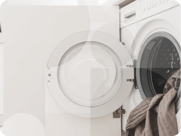 Washing machine door integrated into cupboard.