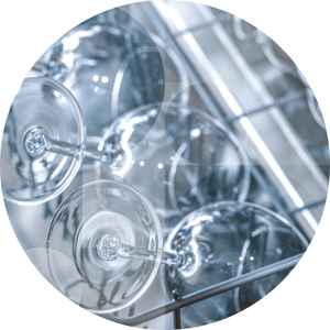 Clean glasses in a dishwasher.