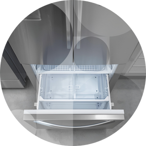 A fridge freezer's large interior drawer.