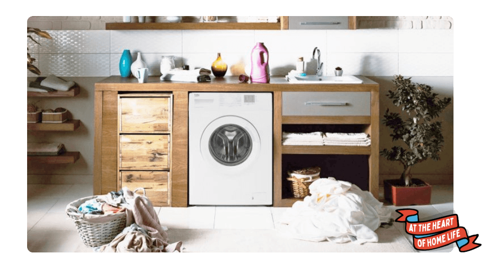 Beko WTG620M1W 6kg Load Washing Machine in white in a modern laundry room