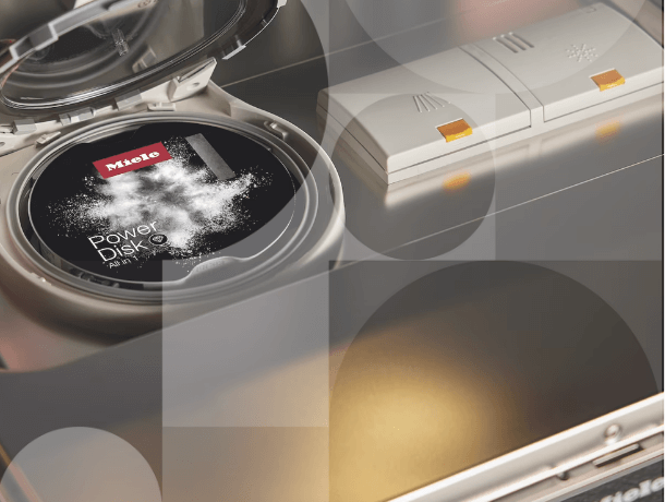 Person inserting dishwasher tablet.